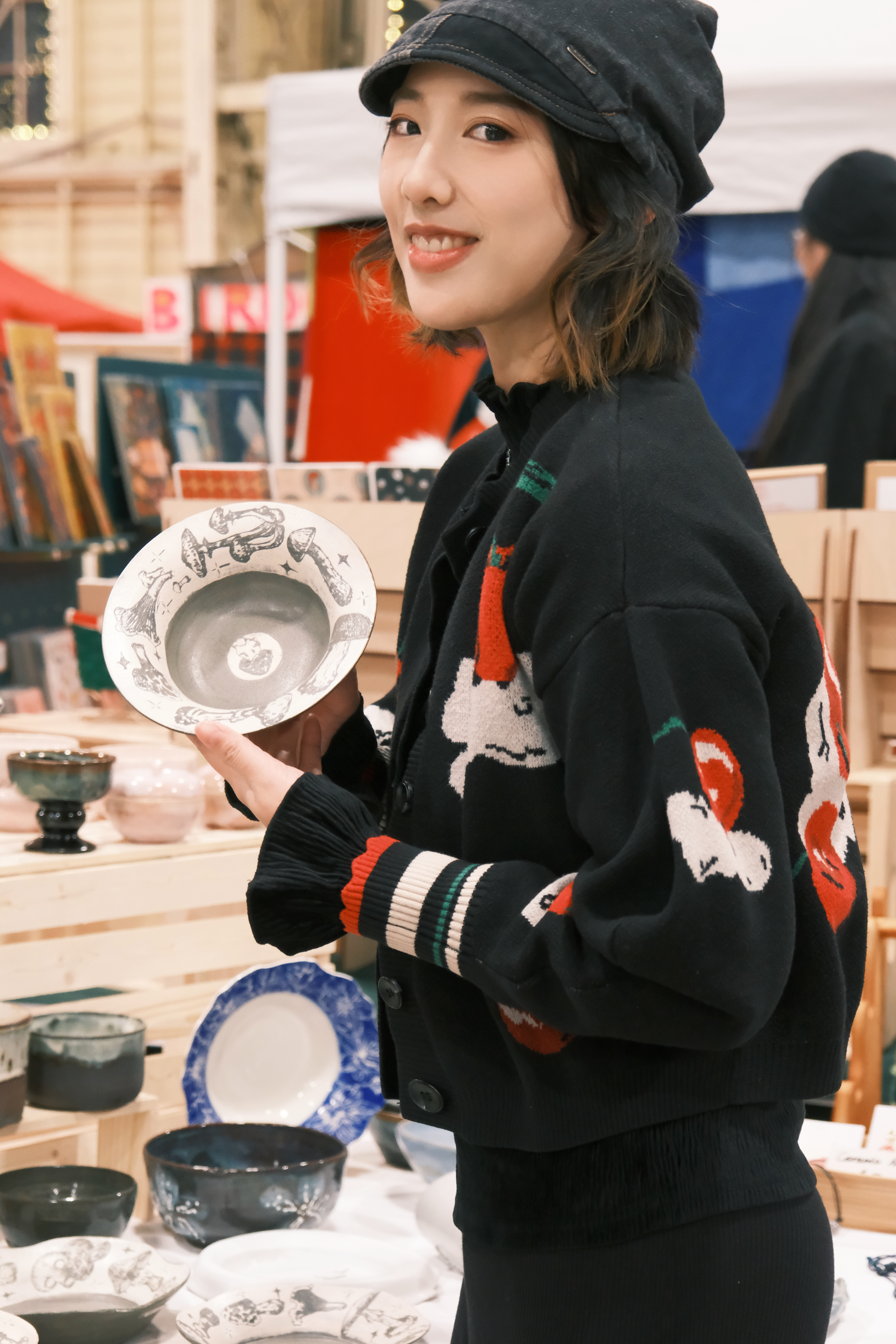 The artist with her pottery